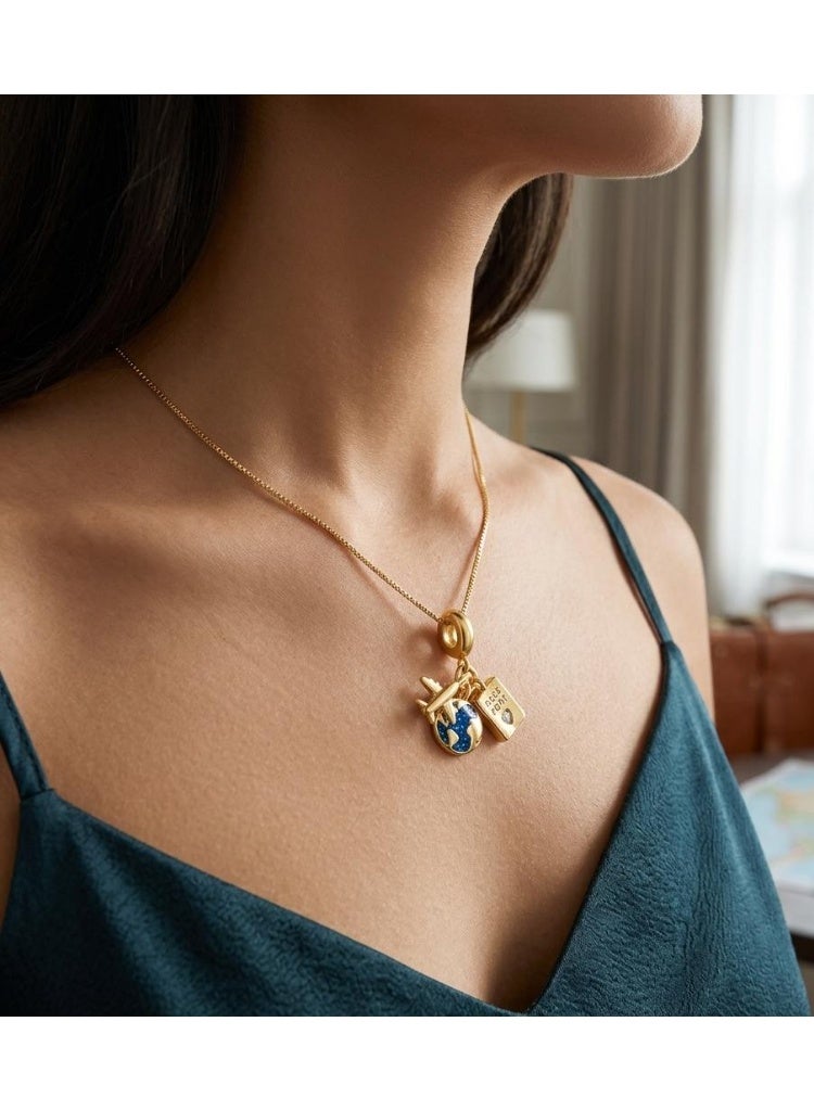 Luxuria A gold necklace with three detailed pendants: an airplane, a blue planet, and a passport. For women. - Image 2