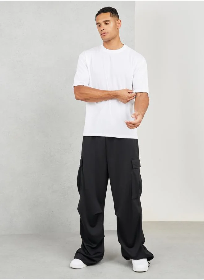 ستايلي Styli Oversized Roll Up Sleeves Box T-shirt with Side Slit