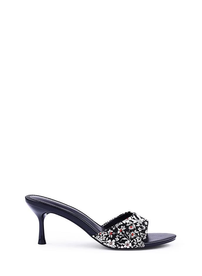 أيقون صنادل نسائية بكعب خنجر وطبعات زهور