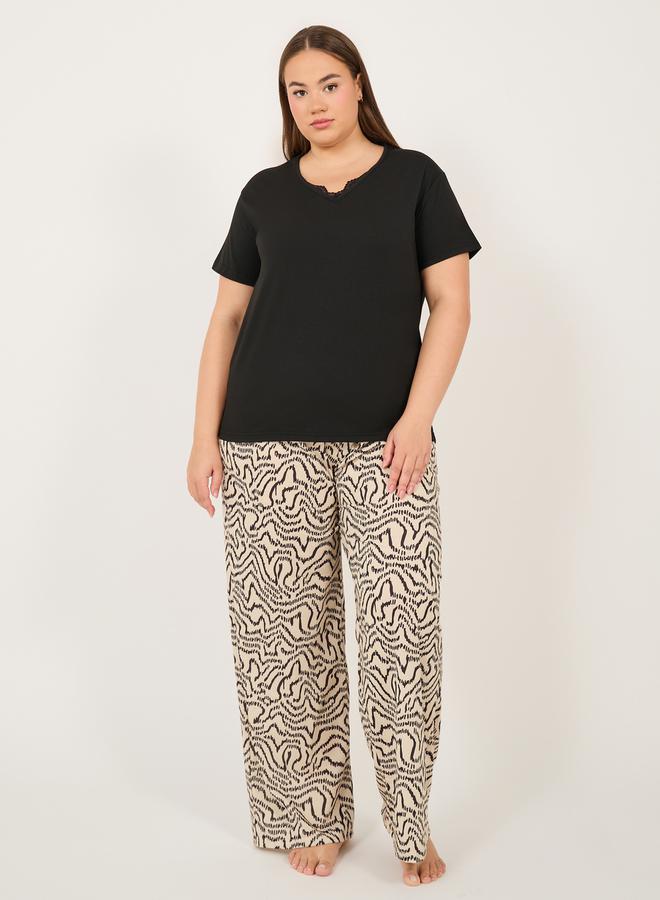 Styli Plus Size Solid T-Shirt and Printed Pyjama Set  - Image 1