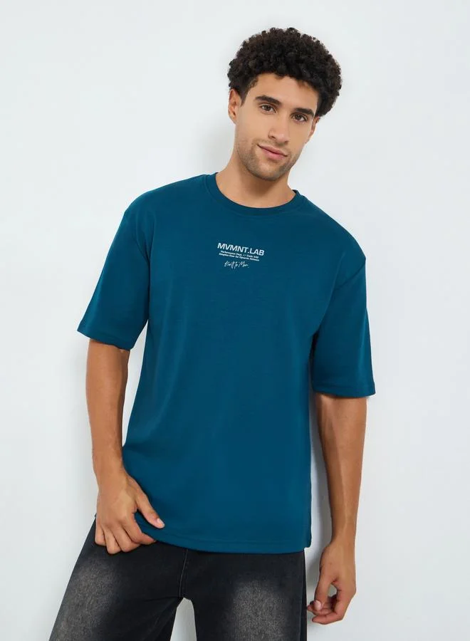 Styli Active Men Oversized Minimal Front Print T-Shirt