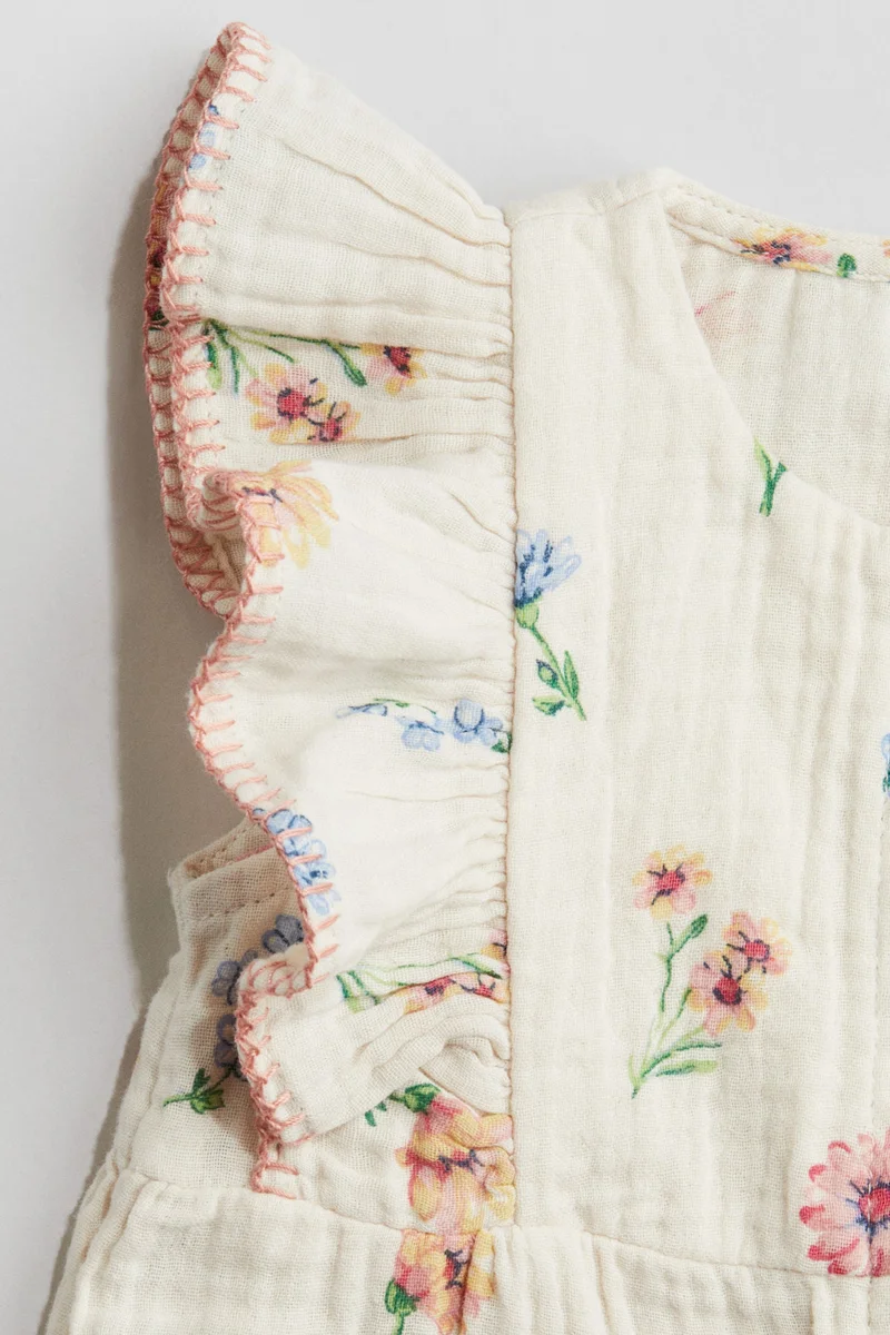 H&M Frilled muslin romper suit