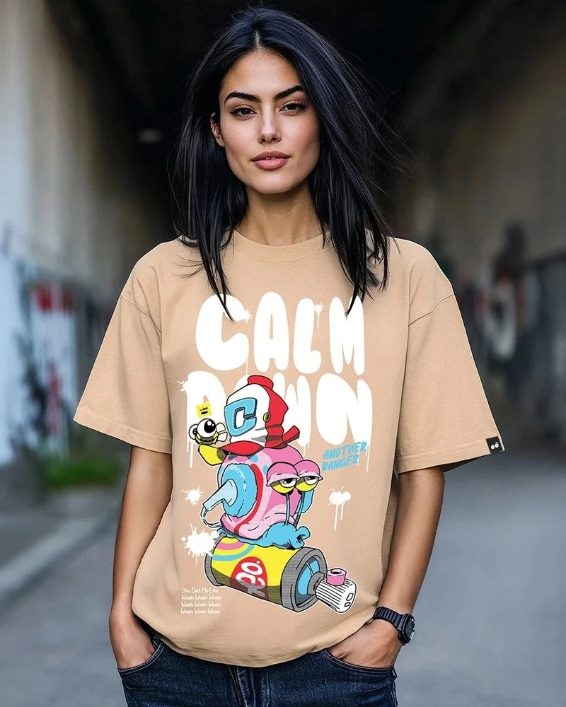 بيواكوف تيشيرت نسائي واسع بطبعة اهدئي باللون البني