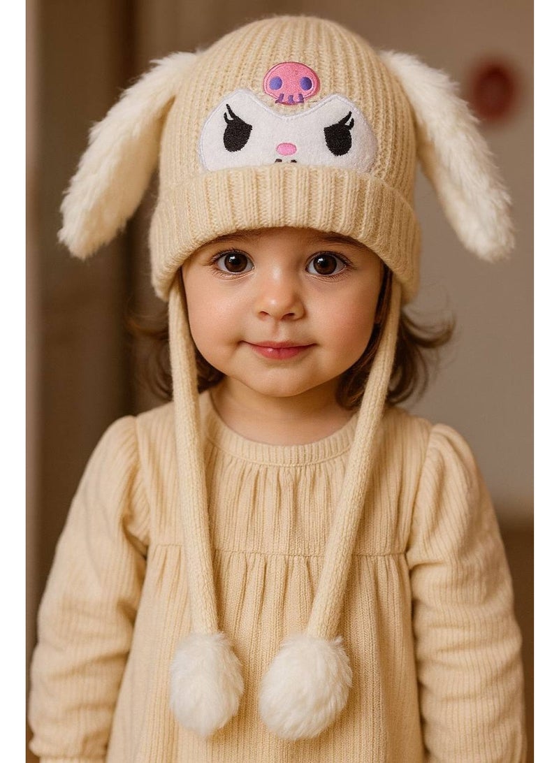 Children's winter hat 🐰❄️ Cute bunny design with soft ears and two pom-poms on the sides, warm and comfortable for the cold season.