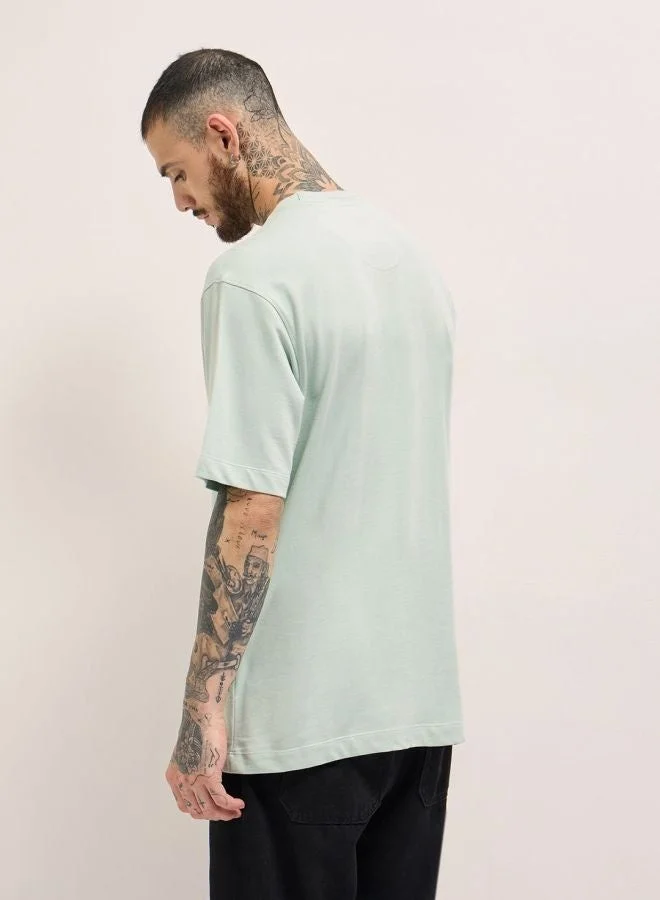 THE BEAR HOUSE  Men's Light Green Graphic Print Oversize Crew Neck T-shirt Perfect For Casual Wear, Gym, Travel, Or Layering Stylish And Versatile Essential For Every Wardrobe for Men | Best Price UAE