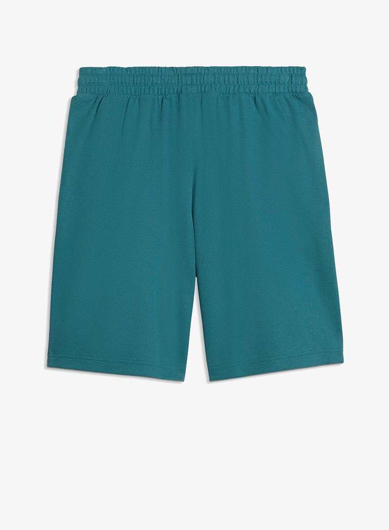 PUMA 9" Essential Elevated Relaxed Shorts - Image 5