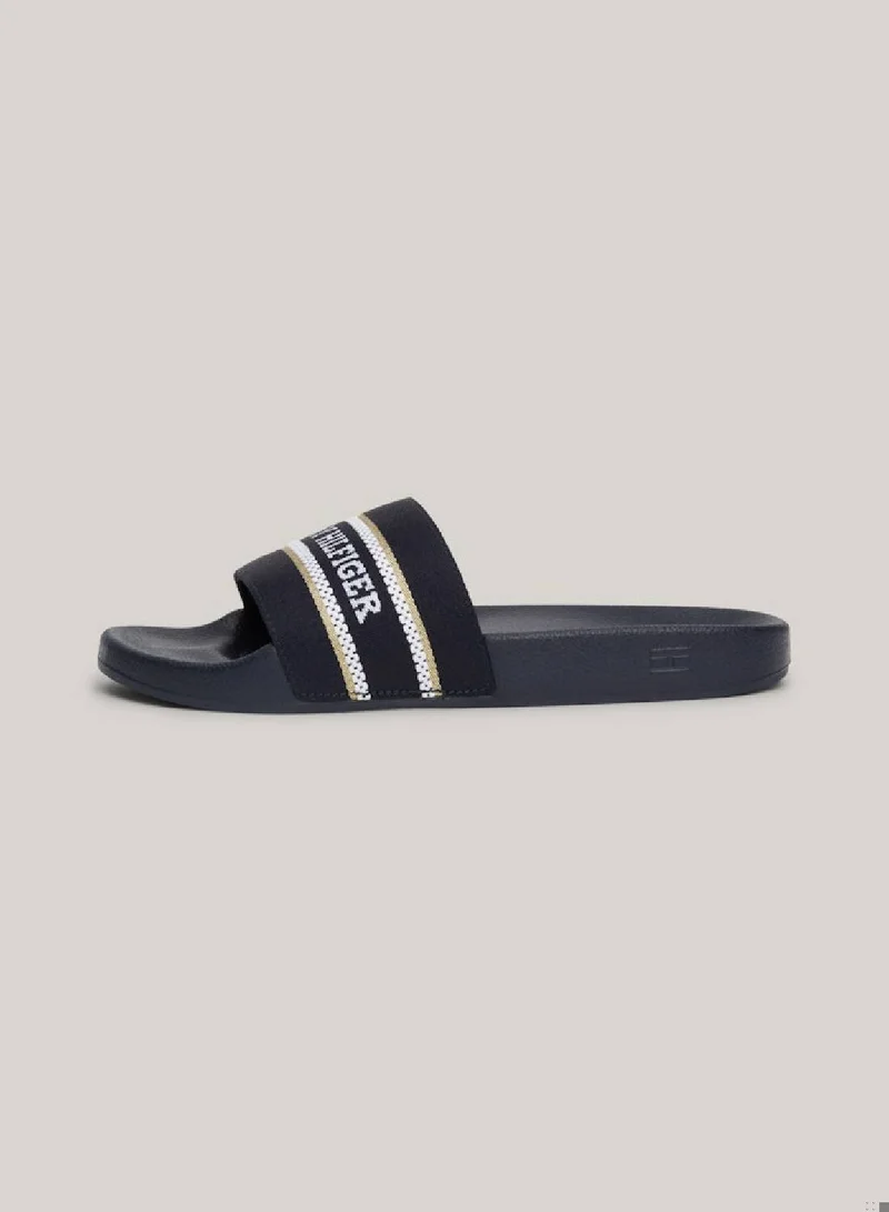 TOMMY HILFIGER Women's Logo Strap Webbing Pool Slides -  Polyester webbing upper, Blue