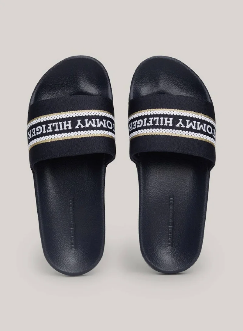 TOMMY HILFIGER Women's Logo Strap Webbing Pool Slides -  Polyester webbing upper, Blue