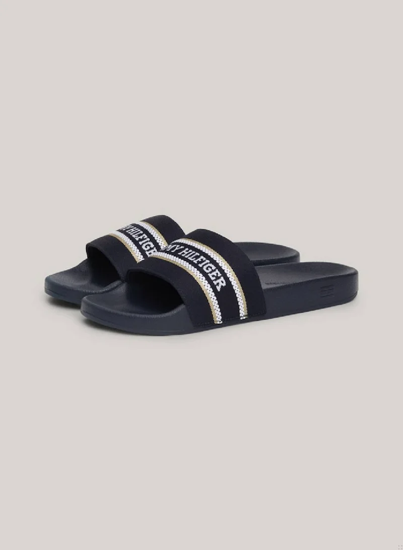 TOMMY HILFIGER Women's Logo Strap Webbing Pool Slides -  Polyester webbing upper, Blue