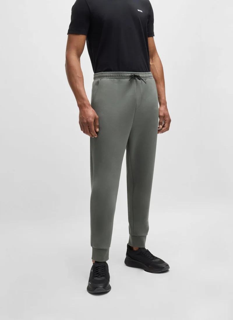 بوس Stretch-cotton tracksuit bottoms with logo print