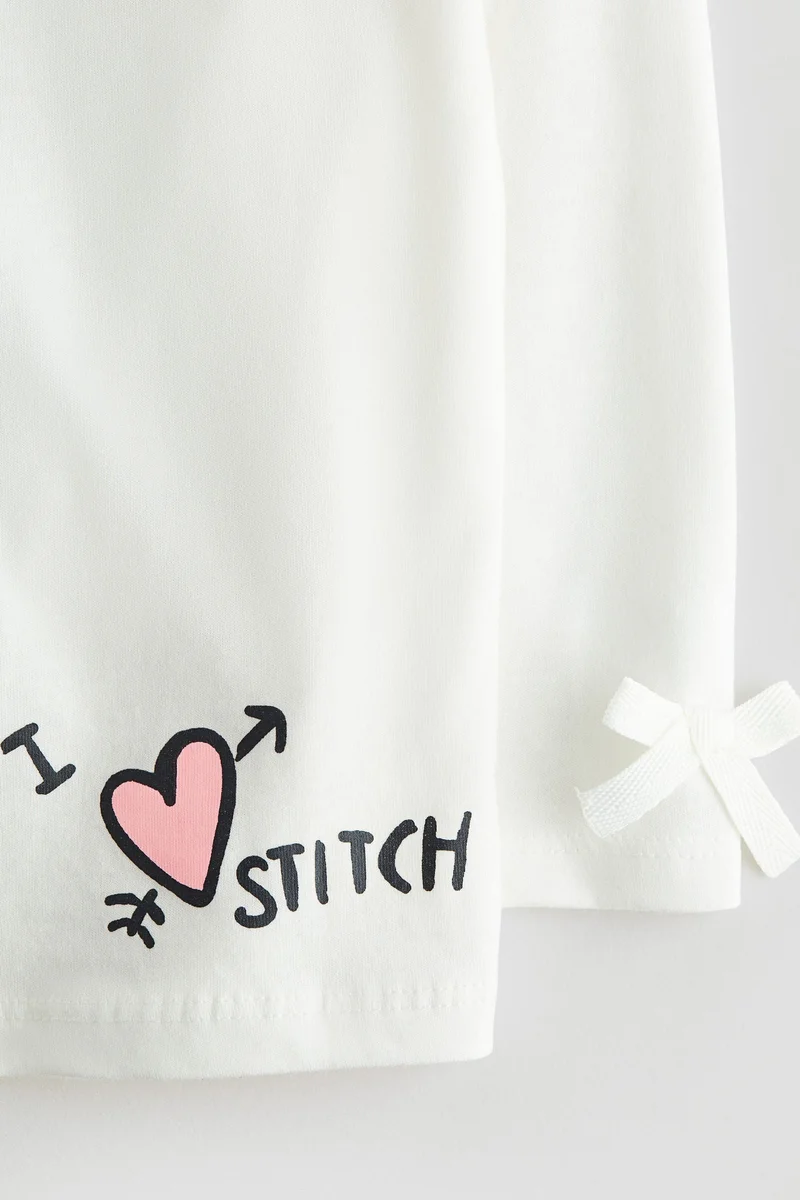 H&M Printed bow-detail top