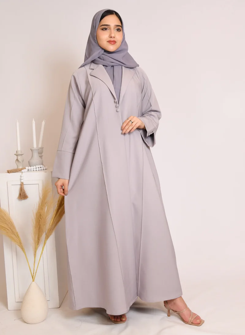 HAWRAA ABAYA Grey blazer style abaya decorated with buttons and a pleat at the back