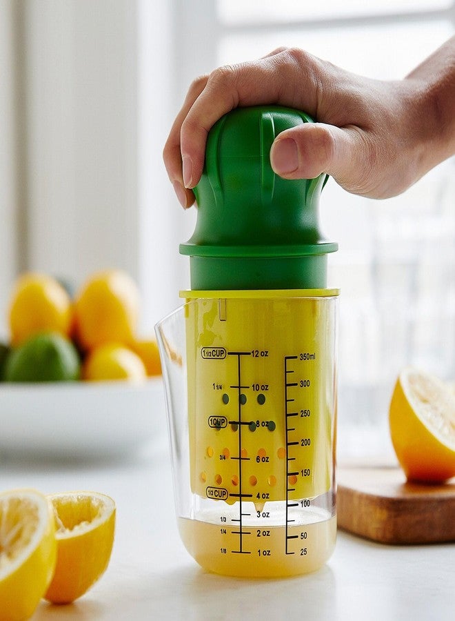 Sur La Table Manual Citrus Juicer – High-Performance Hand Juicer with Clear Measuring Cup, Yellow Reaming Cone, Green Plunger & Metal Prong for Maximum Juice Extraction - Image 2