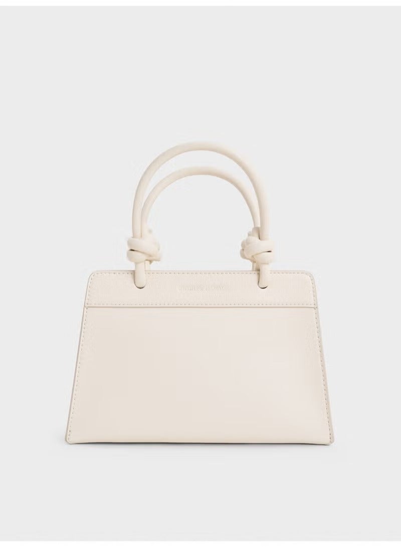 Charles & Keith CHARLES & KEITH Sabine Knotted-Handle Trapeze Tote Bag & Handle Bag & Crossbody Bag for Women  - Image 1