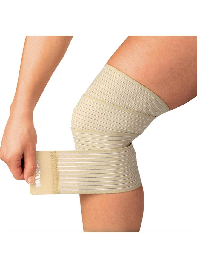 MUELLER Sports Medicine All-Purpose Support Wrap for Men and Women, Adjustable Compression for Joint and Muscle Support, Beige, Regular (Pack of 1) - Image 1