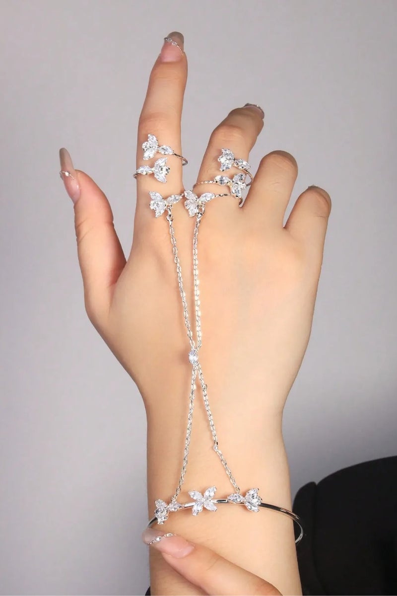 Women's Hand Bracelet Accessory in Silver Color with a Chain Design Connecting Two Rings. - Image 1