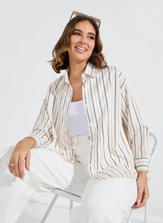 تايك تو بلوزة فضفاضة مخططة بازرار غلق