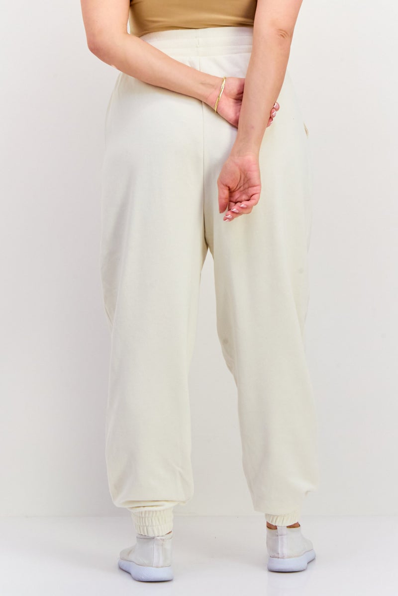 PUMA Women Sportswear Fit Embroidered Logo Training Sweatpants, Off White - Image 3