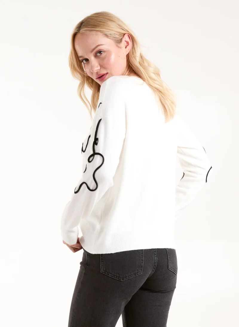 بلو فانيلا كنزة بنقش زهري