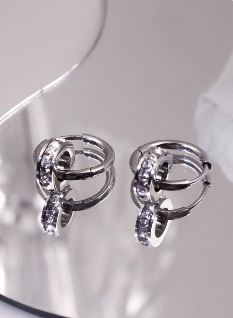 إيكوال حلق اذن نسائي من الاستانلس ستيل دائري باللون الفضي أنيق وعالي الجودة - Image 1