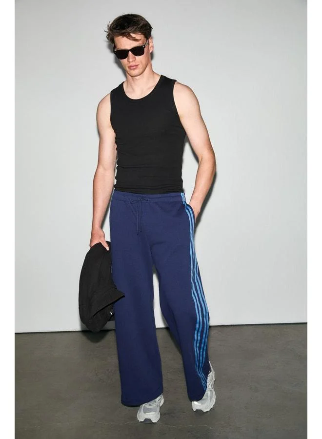 Grimelange BEZIERS Men's Organic Cotton Contrast Striped Regular Fit Navy Sweatpants.