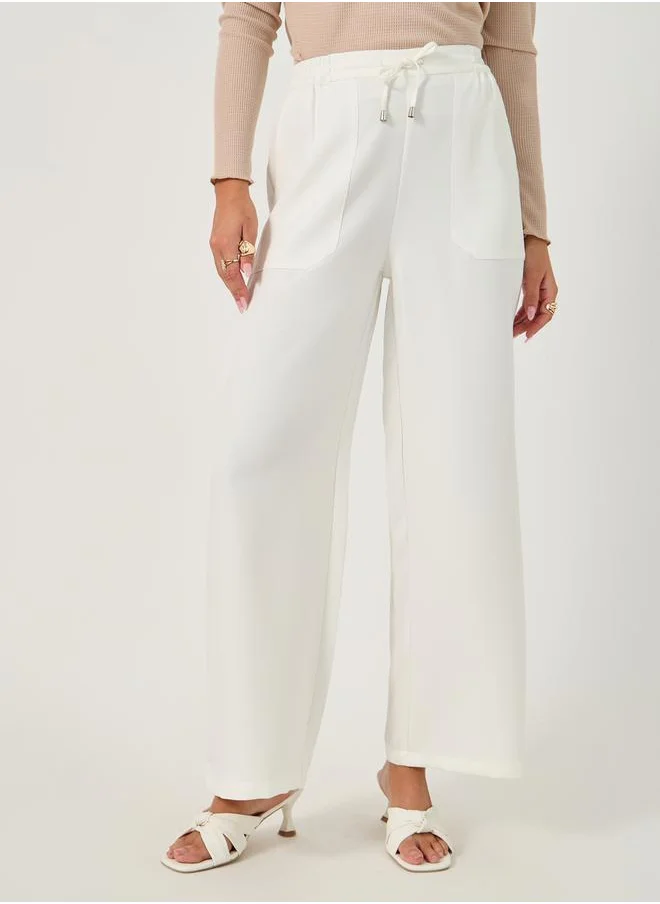 ستايلي High Rise Tapered Pants with Drawstring Waistband Detail