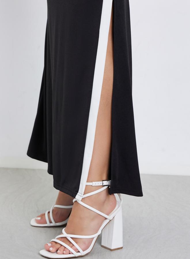 ستايلي فستان طويل بحافة واسعة وأكتاف مكشوفة مع حواف متباينة - Image 5