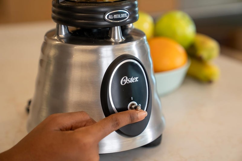 Oster خلاط تراثي من سلسلة كلاسيك مع وعاء زجاجي سعة 6 أكواب، قوة 1000 واط، خلاط مطبخ من الفولاذ المقاوم للصدأ - Image 1