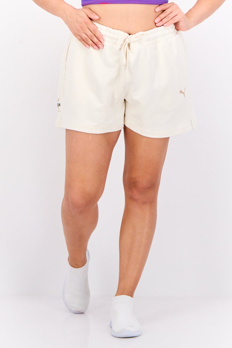 PUMA Women Sportswear Fit Brand Logo Running Shorts, Ivory - Image 1