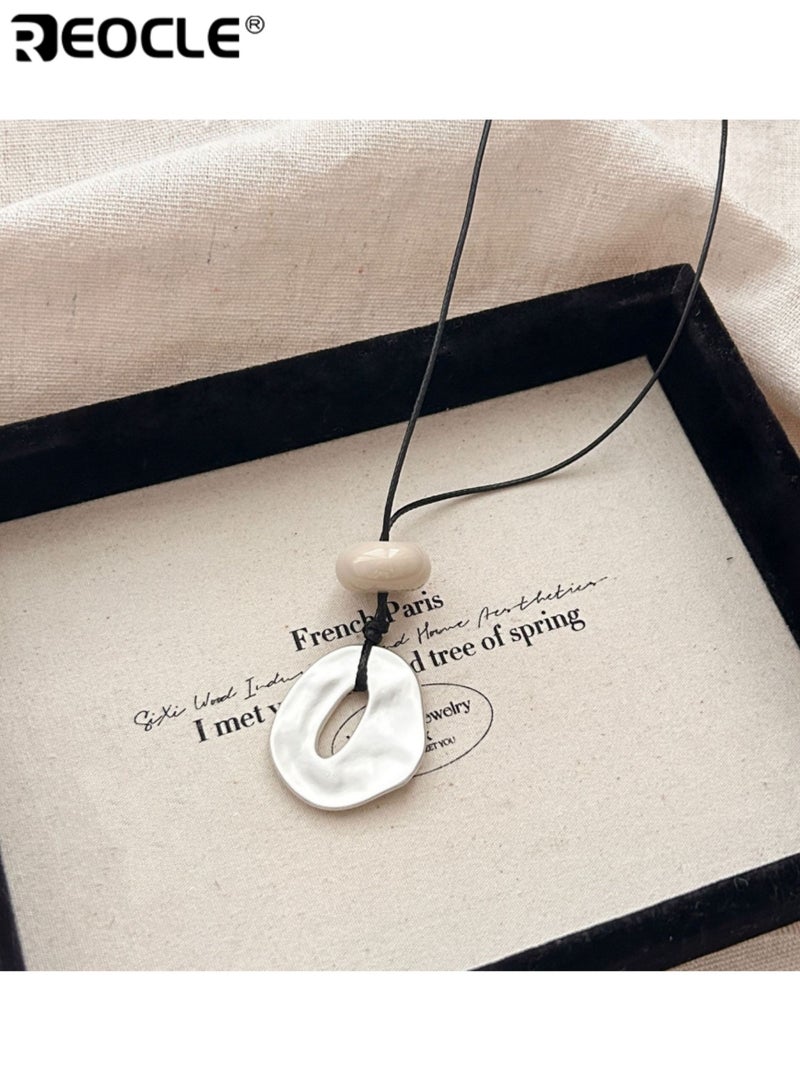 ريوكل قلادة نسائية غير منتظمة الشكل قلادة فنية بسيطة مع حبل أسود قابل للتعديل قلادة عصرية على الطراز البوهيمي بتصميم هندسي فريد - Image 2