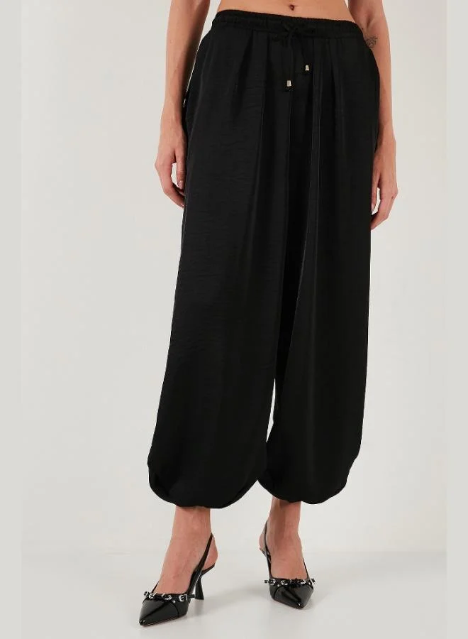 ليلا بنطلون شالوار نسائي ليلا بقصة بالون واسعة ورباط من الساتان