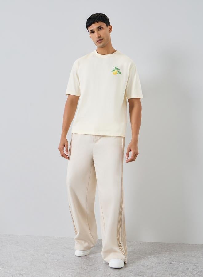 ستايلي تيشيرت واسع مطبع بطبعة جرافيك - Image 2