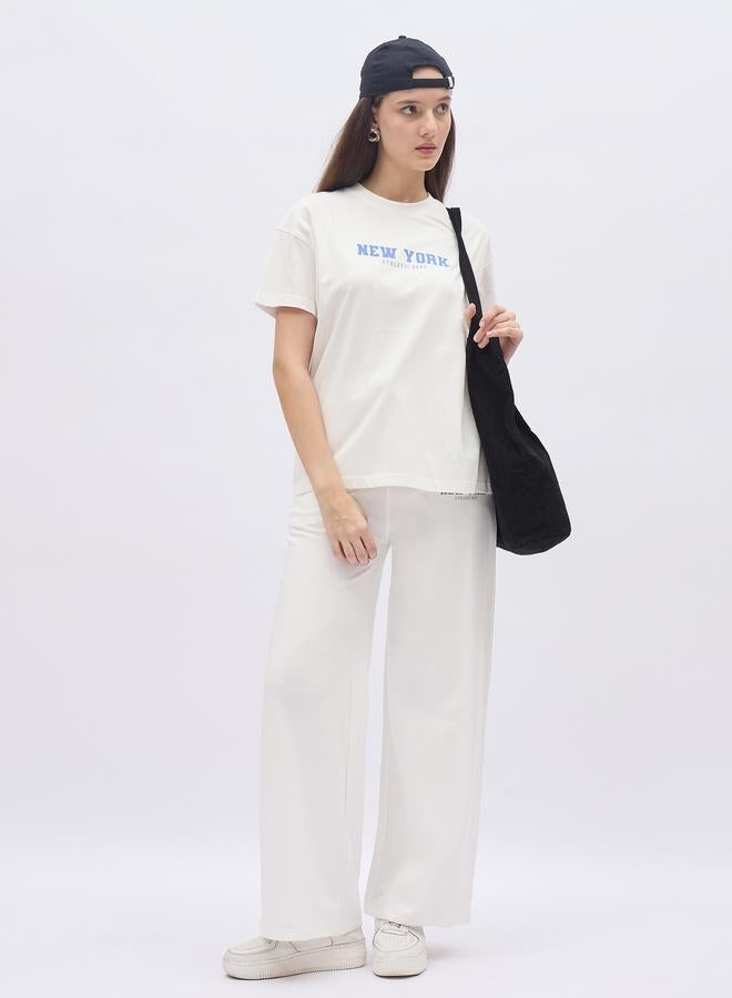 Styli Off White Slogan Print Boxy T-Shirt and Wide Leg Joggers Co-Ords - Image 1