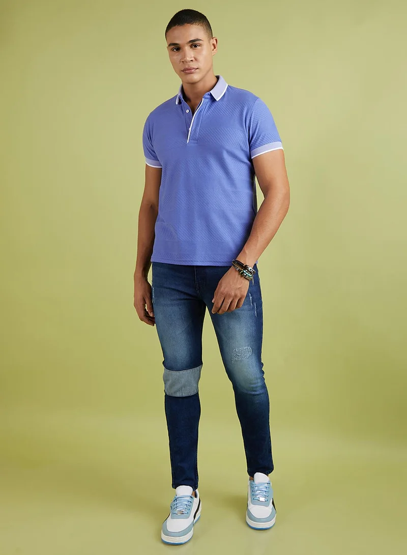 Campus Sutra Campus Sutra Men's Lilac Self-Design Horizontal Striped T-Shirt For Casual Wear | Spread Collar | Short Sleeve | Half-Button Closure | Polycotton T-Shirt Crafted With Comfort Fit For Everyday Wear