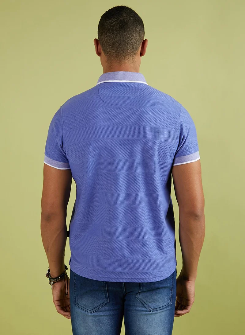 Campus Sutra Campus Sutra Men's Lilac Self-Design Horizontal Striped T-Shirt For Casual Wear | Spread Collar | Short Sleeve | Half-Button Closure | Polycotton T-Shirt Crafted With Comfort Fit For Everyday Wear