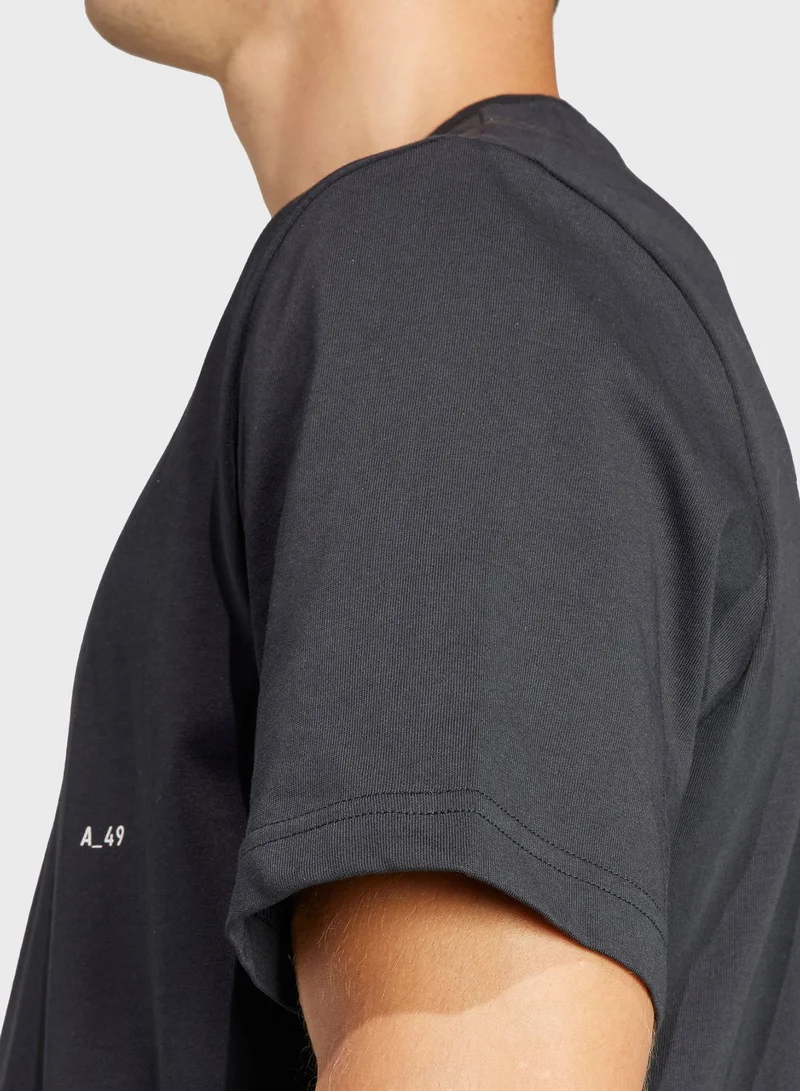adidas تيشيرت رياضي مزين برسومات