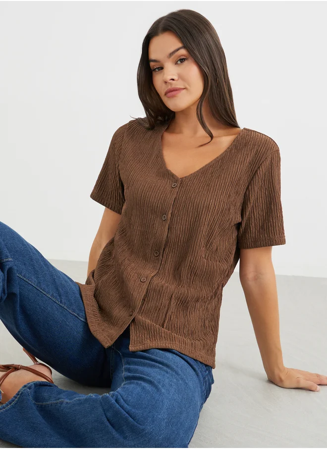 ستايلي Styli Textured V-Neck Front Button Blouse
