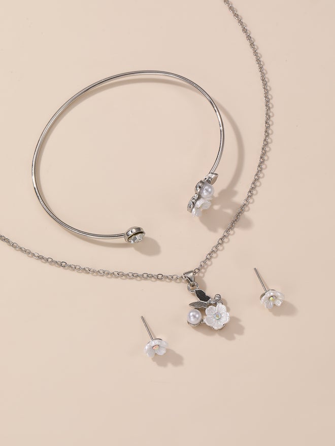 تايك تو طقم من قطعتين - عقد وسوار وأقراط على شكل زهرة - Image 1