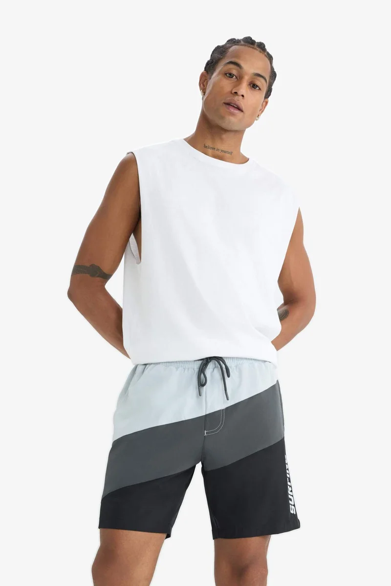 ديفاكتو DeFactoFit Regular Fit Flexible Textured Sports Swim Shorts