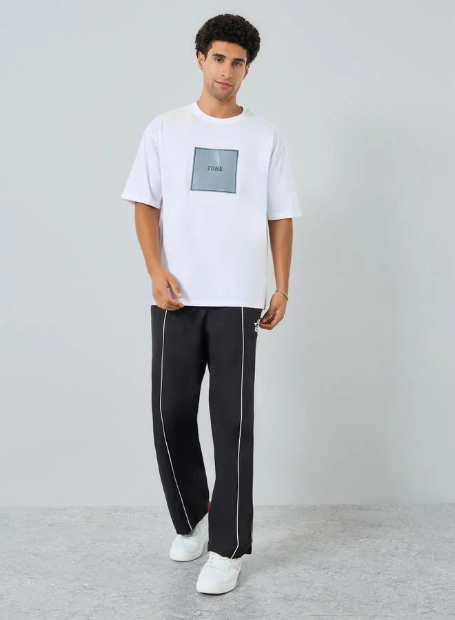Styli Men White Graphic Print Oversized T-Shirt