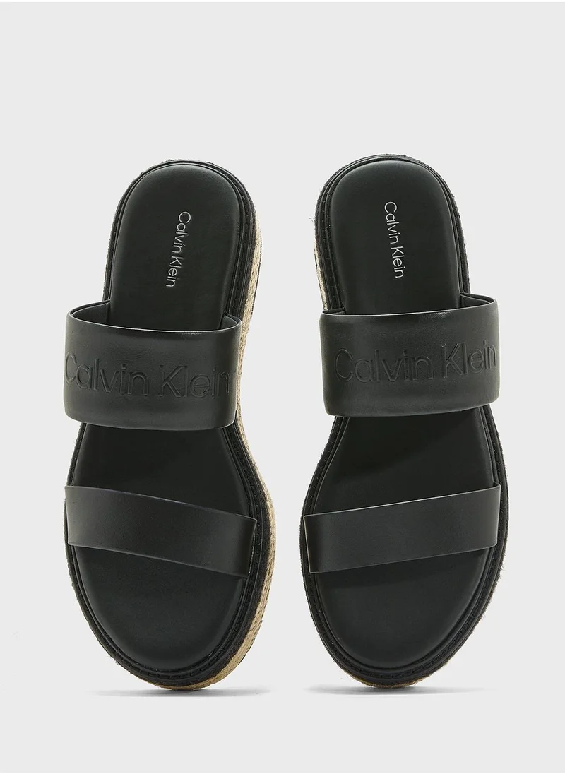 CALVIN KLEIN FLATFORM WEDGE SLIDES