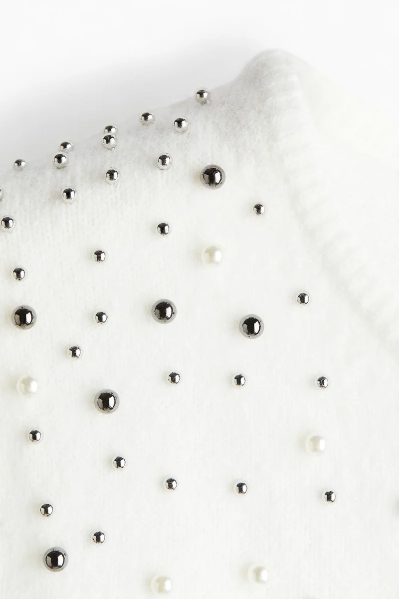 اتش اند ام بلوزة محبوكة مزينة بتطريزات