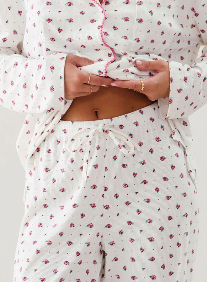 انديز بنطلون جيرسيه مضلع بنمط زهري