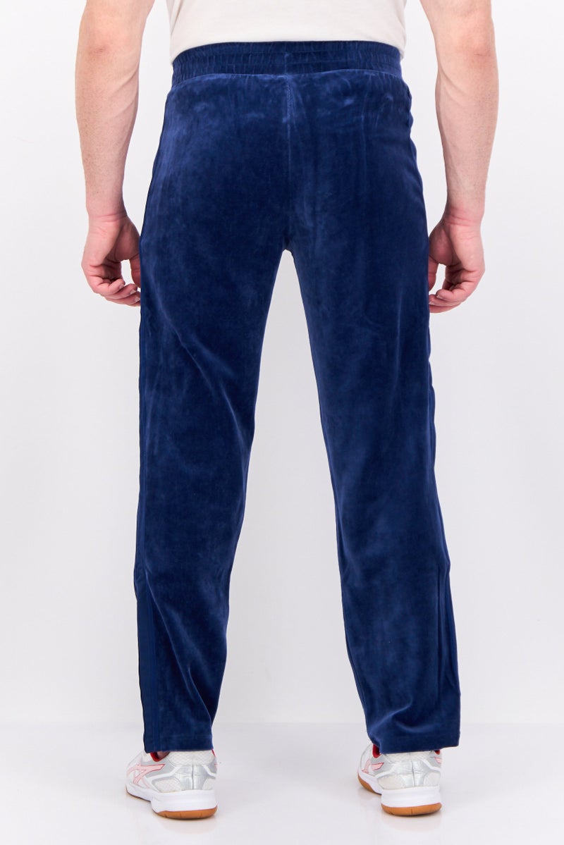 PUMA Men Sportswear Fit Outdoor Track Pants, Blue - Image 3