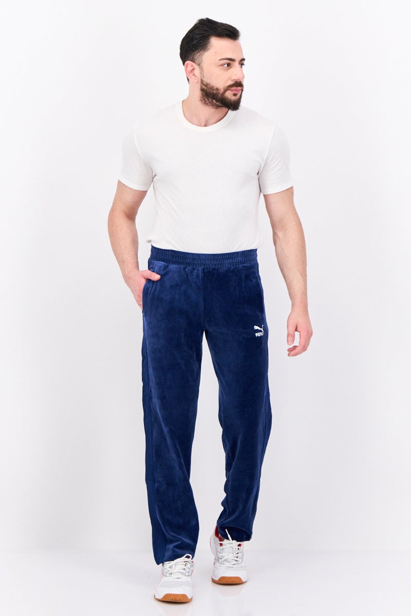 PUMA Men Sportswear Fit Outdoor Track Pants, Blue - Image 4