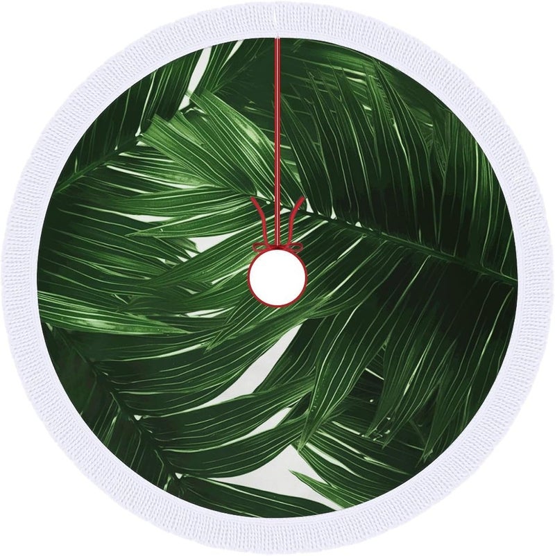 Green Palm Leaves Christmas Tree Skirt Classic Round Xmas Tree Skirt Protects Floors Christmas Tree Mat with Tassels for Winter Holiday Party Indoor Decor - Image 1