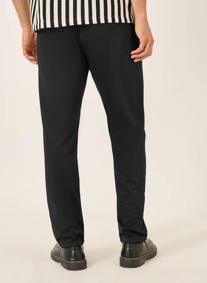 Styli  Solid Slim Fit Knitted Pants for Men | Best Price UAE