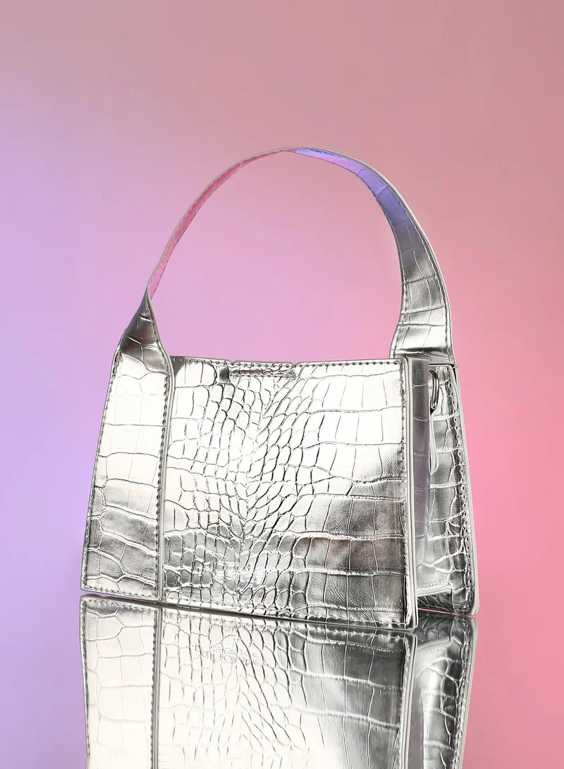 صوص هاوت Haute Sauce Women's The Frivola Croc Hand Bag For Casual Wear | Metallic Silver Colour | One-Size| Magnetic Closure | Vegan Leather Material | Non-Detachable Handle | Bags For Woman & Girls