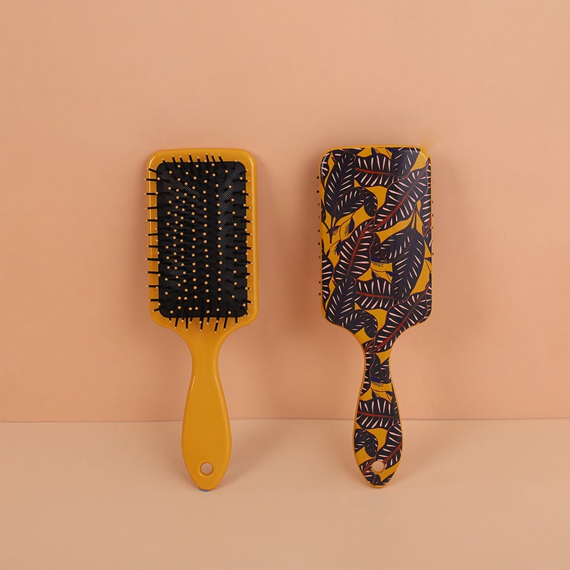 Huiyun factory direct in stock net red printing airbag square comb not knotted massage comb curly comb straight comb Yellow print