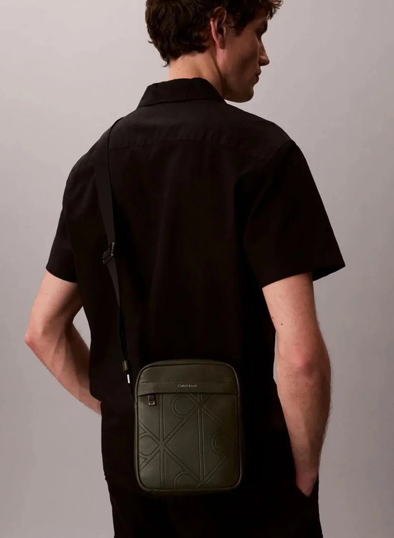 Calvin Klein Deep Depths Allover Embossed Emblem Logo Reporter Bag for Men | Best Price UAE